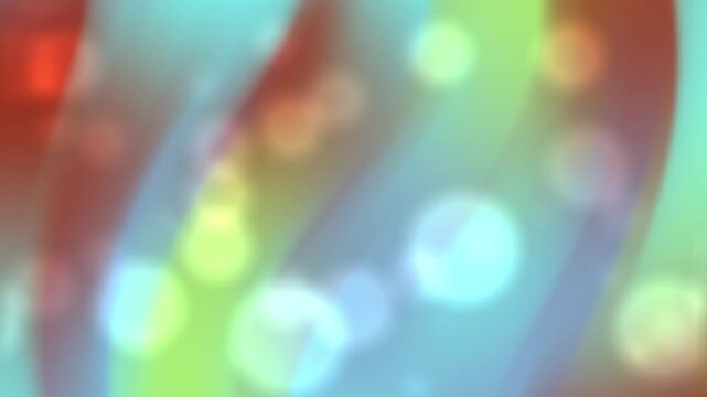 Soft bokeh lights floating over vibrant colorful wavy gradients