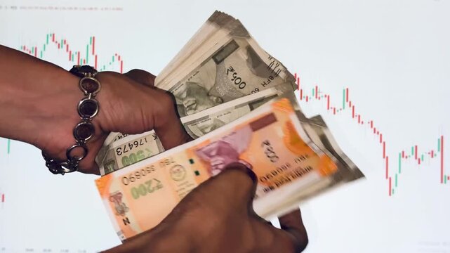 Close-up of fingers counting Indian ₹500 banknotes, representing cash handling, business transactions, budgeting, and personal finance.