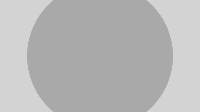 A simple gray circle on a light gray background, representing abstract design and minimalism.