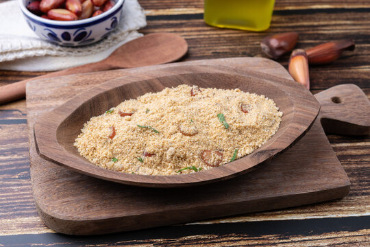 Fafora de pinh&atilde;o, typical brazilian sidedish on a bowl over wooden table