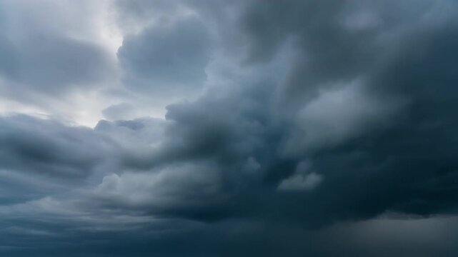 Churning storm clouds time-lapse slow motion with copy space