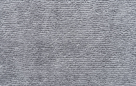 Grey towel texture close up, top view