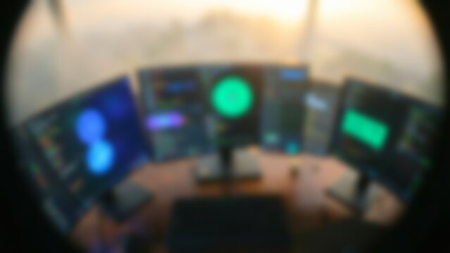 Cybersecurity team monitors glowing screens inside dark security room