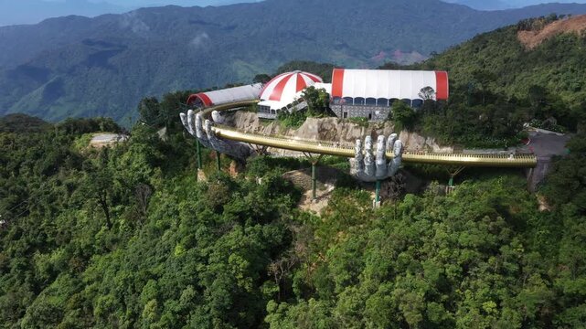 Cinematic Drone Footage of Ba Na Hills Featuring Golden Hands Bridge, Linh Ung Pagoda, Sun World French Village Castle and Mountain View Overlooking Da Nang, Vietnam