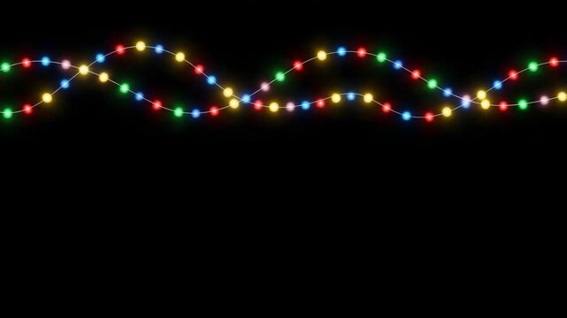 Colorful christmas string lights isolated on black background