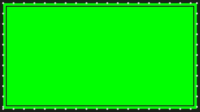 A vibrant green screen with a black border and small white dots, perfect for digital compositing and video editing.