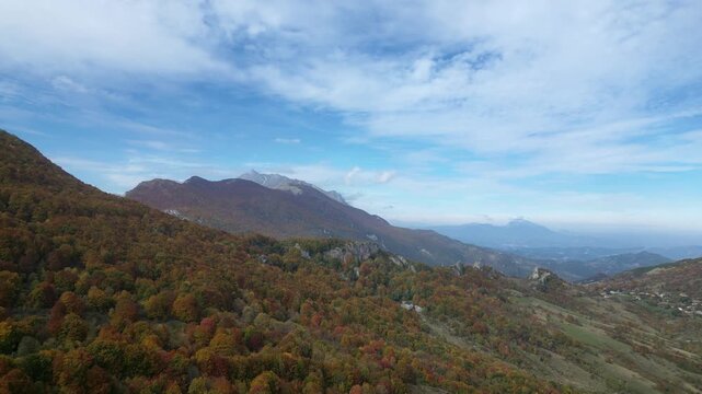 Wide Aerial View of Norway's Autumn Hills and Distant Peaks 4k drone