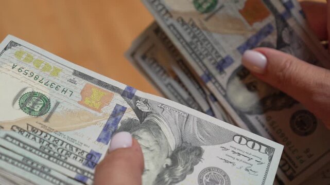 Money dollars cash counting american hundred banknotes in hands representing financial wealth and banking transactions for personal savings and business investment success