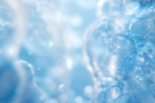 Abstract blurred medical background in clean blue and white tones, healthcare and science concept for backdrop or banner