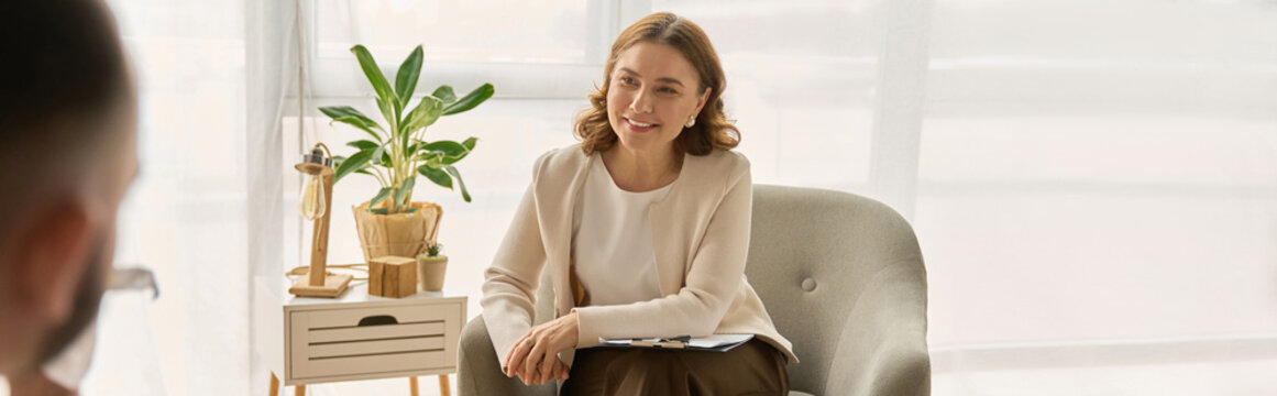 Insightful conversation takes place during therapy session with a compassionate psychologist