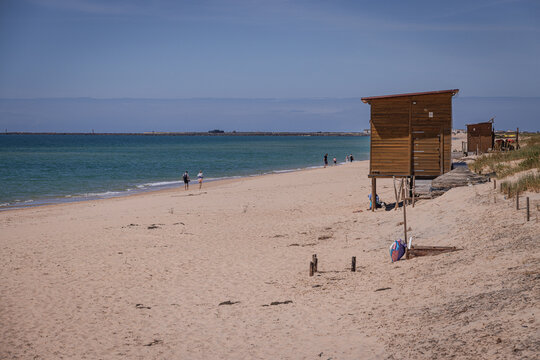Huts on the beach on Culatra Island, Ria Formosa Natural Park, Olh&atilde;o, Algarve, Portugal