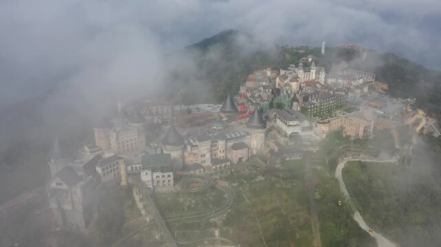 B&agrave; N&agrave; Hills Resort Aerial View: Golden Bridge, Giant Buddha Statue, French Village & Panoramic Da Nang Cityscape, Vietnam