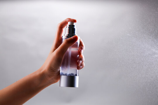 Spray water with a spray bottle