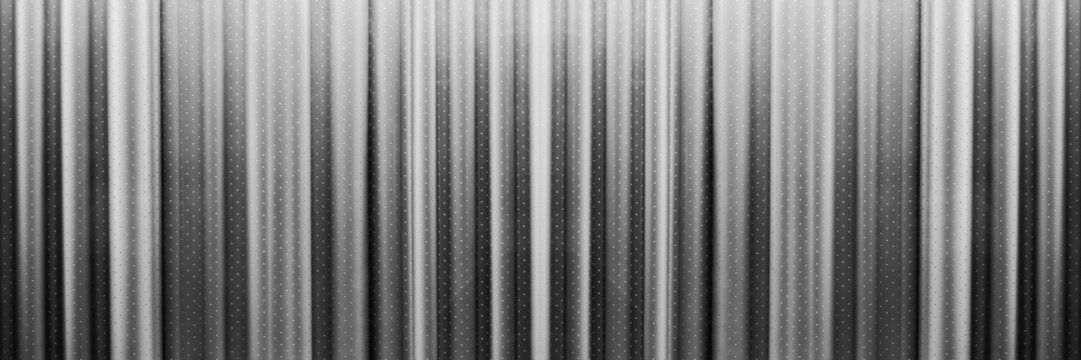 curtain with small polka dots and pleated folds