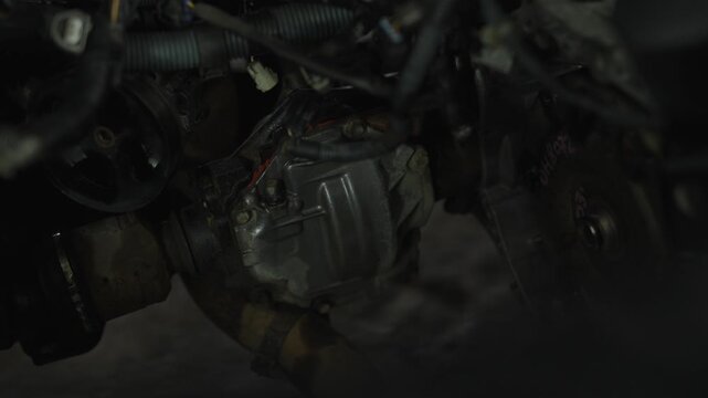 Low angle view of car front differential housing under engine bay.