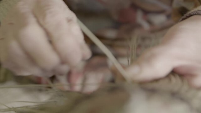 Hands Weaving Traditional Bon Odori Hat in Ugo Town Akita Prefecture J