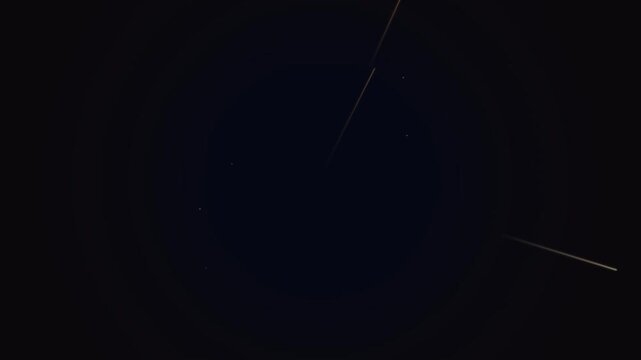 Abstract light streaks moving outward in a dark space travel effect
