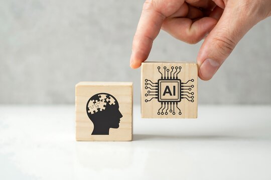 Hand holding AI chip block near human head icon. Artificial intelligence and human mind concept.