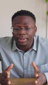 African american man talking directly to the camera during a video call