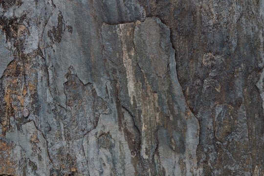 Black marble flooring used for walkways or walls.