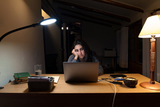 Overworked  Woman Working Late on Laptop