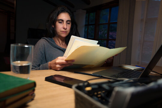 overworked Woman Working Late at office