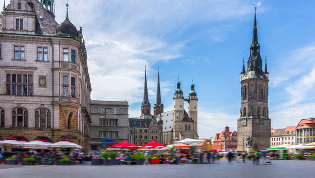 Market Square in Halle (Saale), Saxony-Anhalt, Germany, urban scenery on a sunny day with motion blur