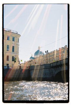 A St. Petersburg canal glitters beneath an Orthodox dome