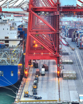 Busy Seaport with Cranes and Containers