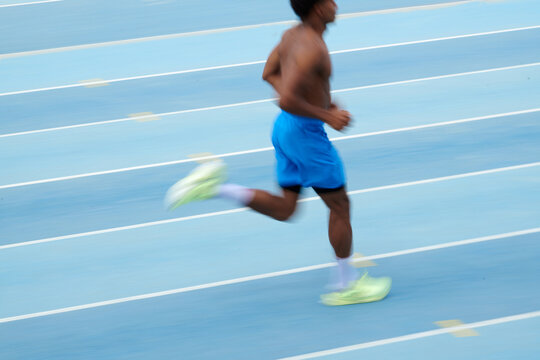 Motion blur photo of man running