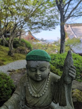 Miyajima Island Stone Buddha Statue with Green Hat, Itsukushima