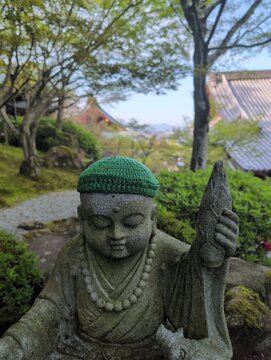 Stone Buddha Statue with Green Cap, Miyajima Island