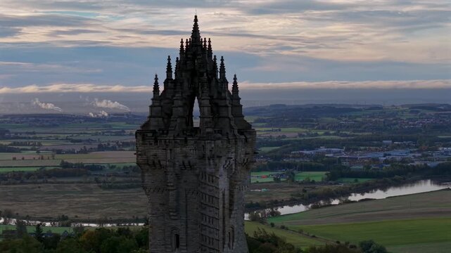 Beautiful Cinematic aerial view of the National Wallace Monument Aerial View Over Stirling, Scotland &ndash; Historic Landmark and Scenic Town Landscape