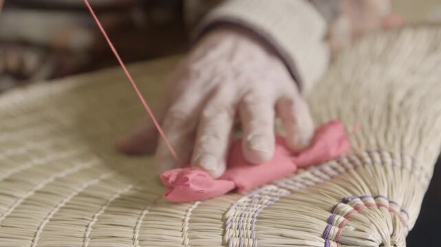 Hands Sewing Traditional Bon Odori Hat in Ugo Town Akita Japan Close U