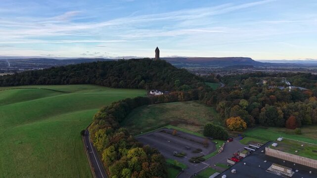 Beautiful Cinematic aerial view of the National Wallace Monument Aerial View Over Stirling, Scotland &ndash; Historic Landmark and Scenic Town Landscape