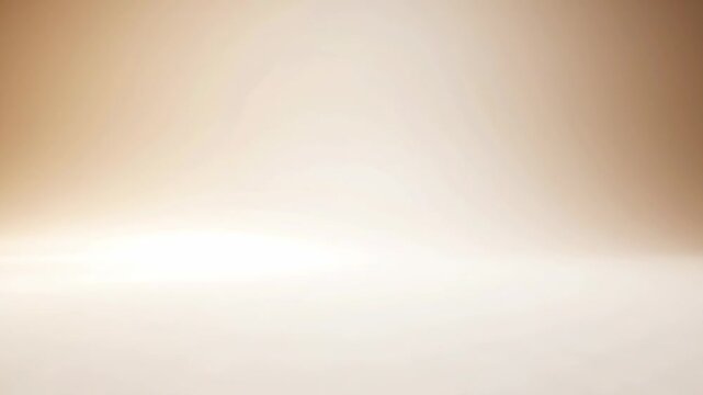 Abstract soft golden gradient background with smooth light transitions