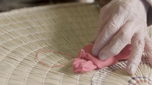 Elderly Hands Sewing Detail on Traditional Bon Odori Hat in Ugo Town A