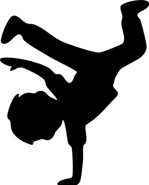 Silhouette of a Young Boy Performing a Breakdance Freeze Pose