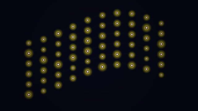 Glowing yellow light bulbs hanging on string lights against dark background