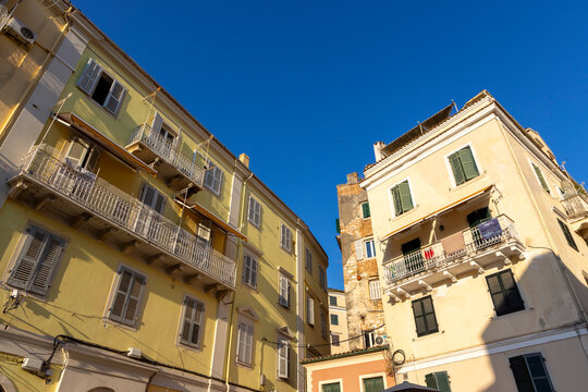 Corfu Old Town residential buildings against blue sky