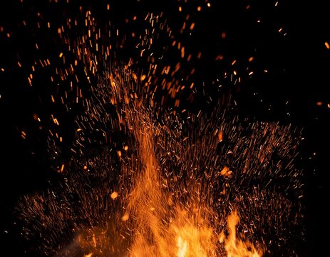 warm orange ember sparks rising on pure black background fire overlay
