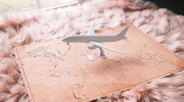 飛行機と世界地図 旅の始まり