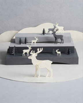 Paper Craft Deer Herd on Layered Grey Terraced Diorama