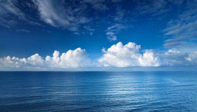 Blue Sky And Clouds Over The Ocean Background