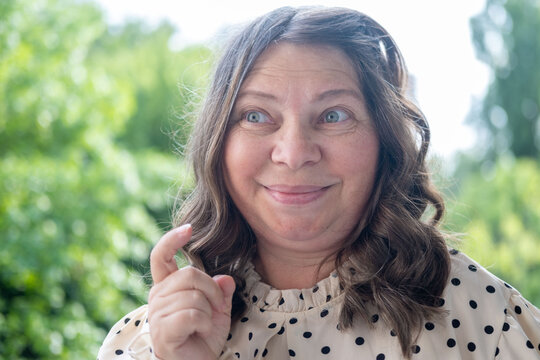 close up portrait shocked mature woman with bulging eyes, surprised facial exaggerated expression, emotional reaction, disbelief, astonishment, surprise and disbelief humor, unexpected discovery