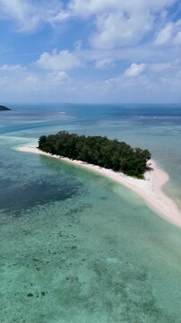 Aerial shot of Kerayaan Beccu Beach, a white-sand beach in Kotabaru, South Kalimantan