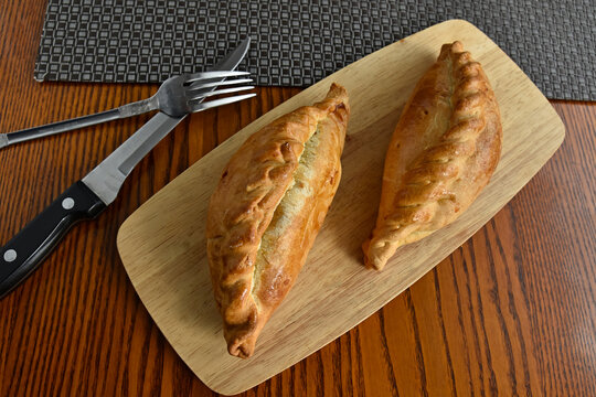 This is a traditional Lithuanian meat and onion pie called kibinas