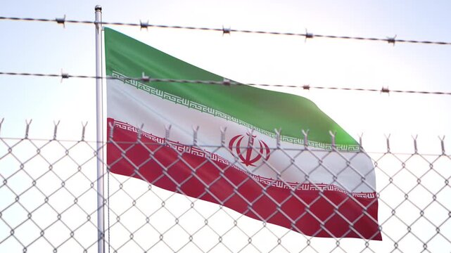 Flag of Iran behind barbed wire fence. Violation of civil liberties, sanctions and isolation