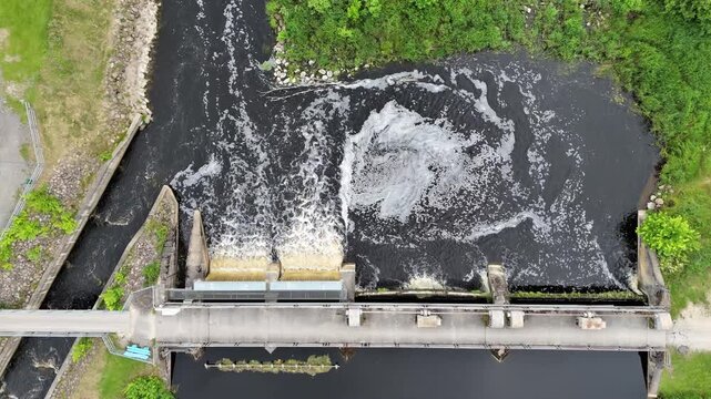Top Down Aerial View of Water Dam with Foamy River Current in Estonia