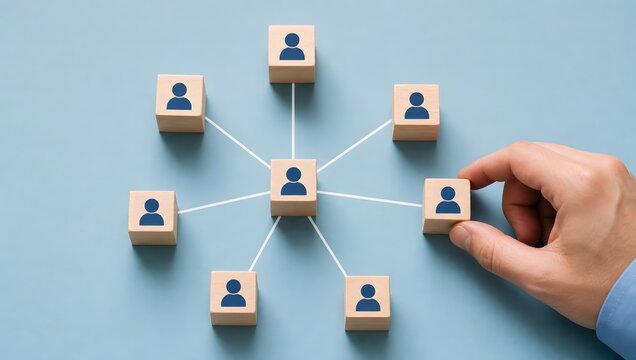 Centralized communication network with wooden blocks and person icons showing business management and organizational structure.